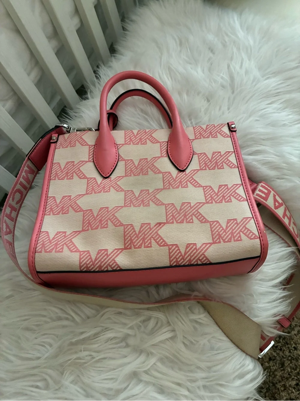 Michael Kors Mirella Small Logo Jacquard Crossbody Bag tea rose pink colorway.